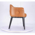 Italian minimalist orange leather single Archibald chairs